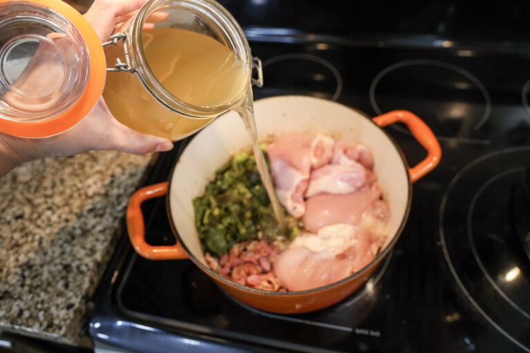 adding ingredients to pot