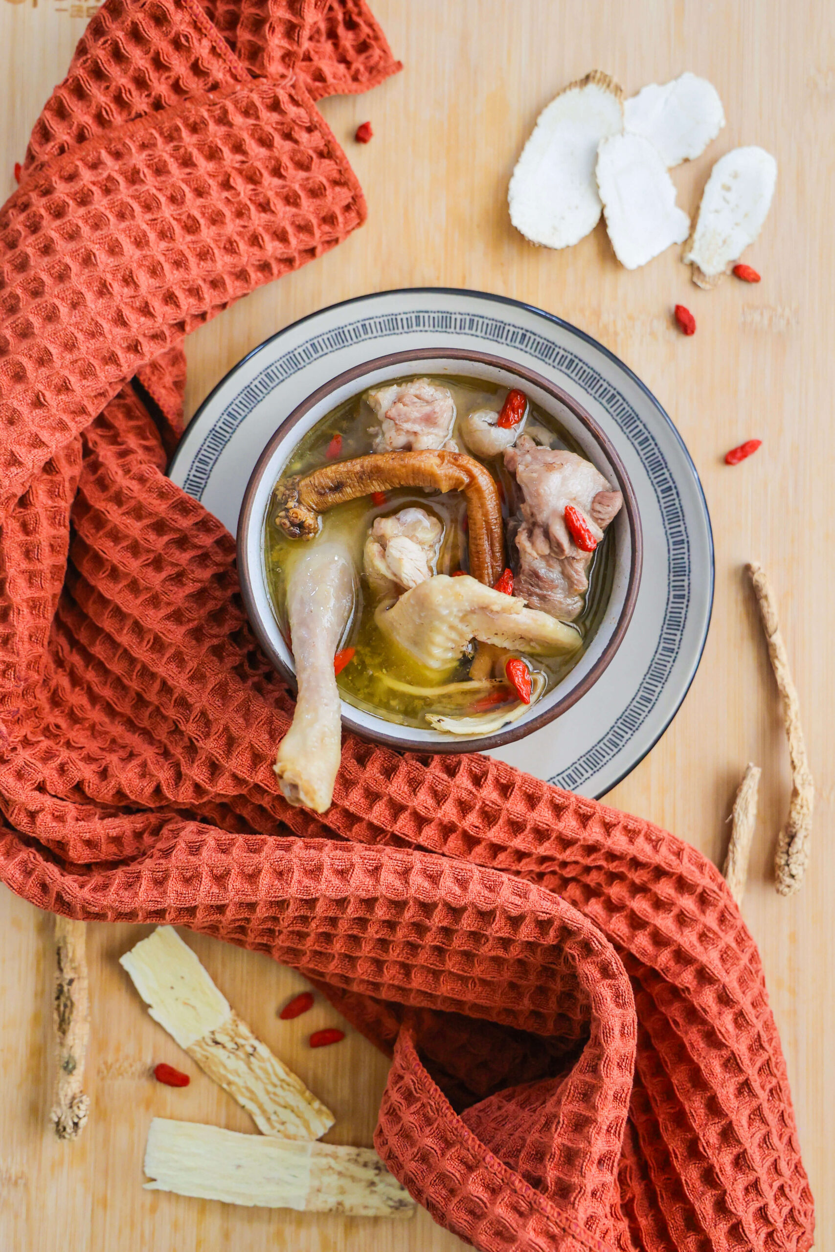 chinese herbal soup with chicken and pork neck bones