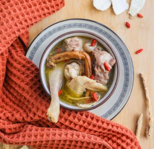 chinese herbal soup with chicken and pork neck bones