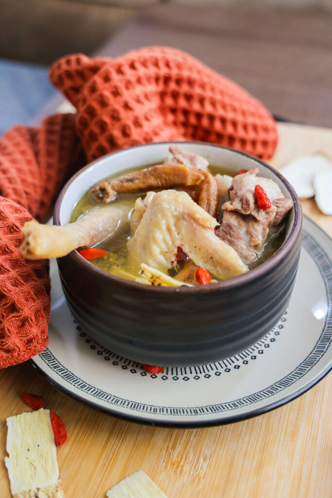 chinese herbal soup with chicken and pork neck bones ready to enjoy